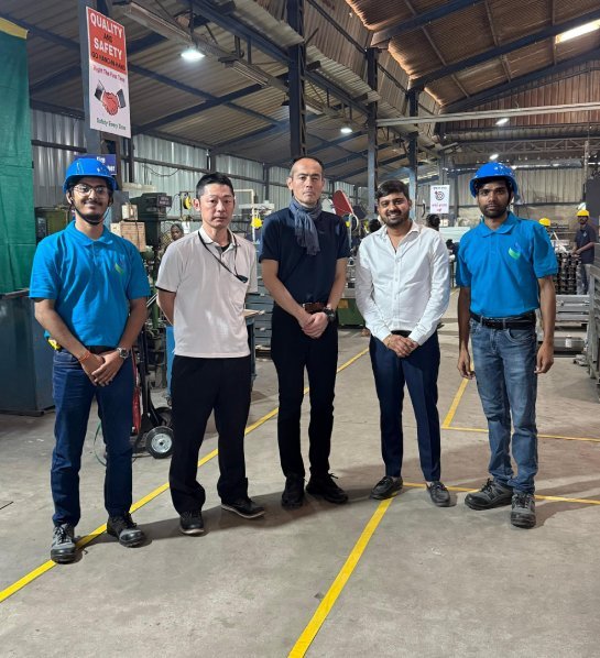 Vasundhara team with visiting clients on the shop floor